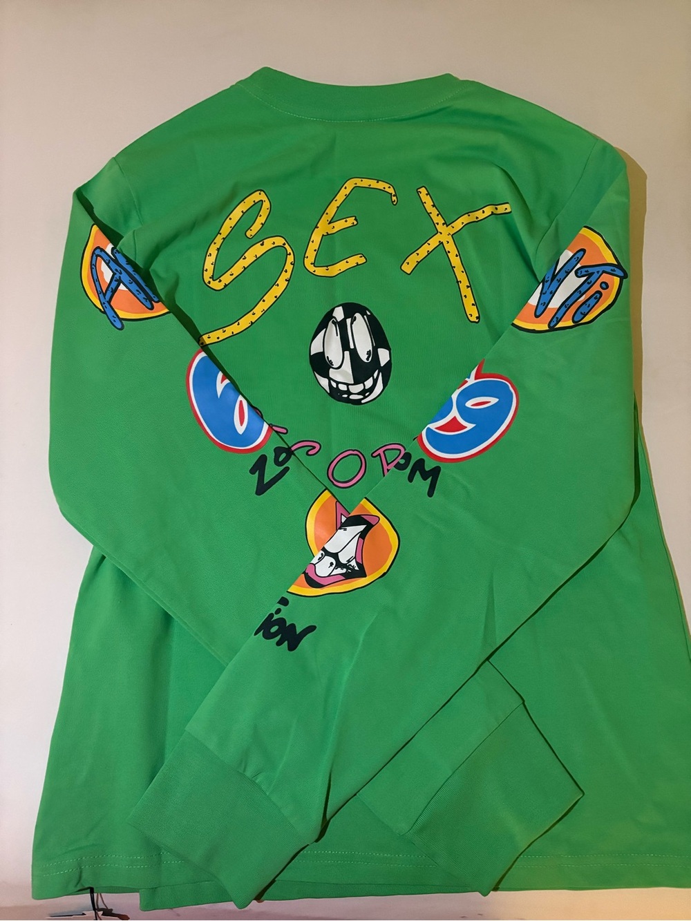 Green Graphic Long Sleeve Tee with Bold Back Art